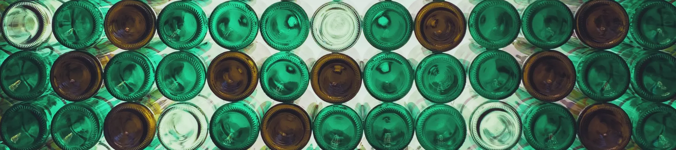 green and brown glass bottles