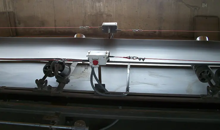 Pullswitch installed on both sides of conveyor