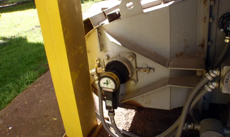 Whirligig shaft sensor mount on conveyor